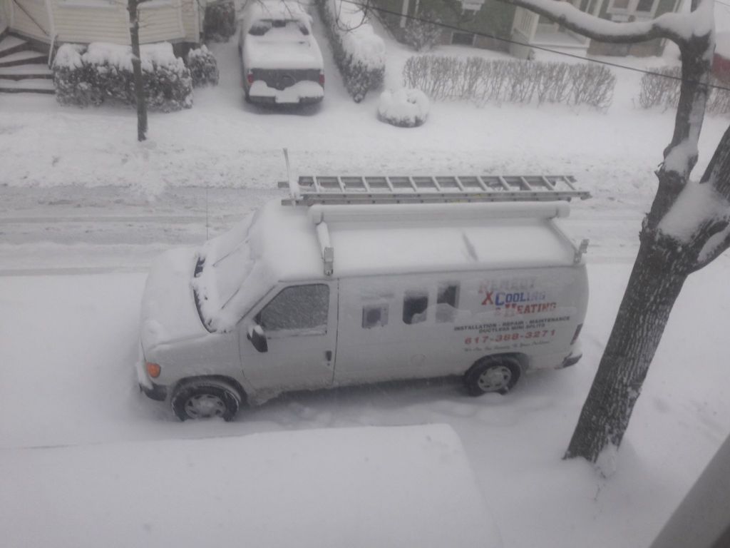 Remedy Cooling and Heating van in a Massachusetts winter snowstorm